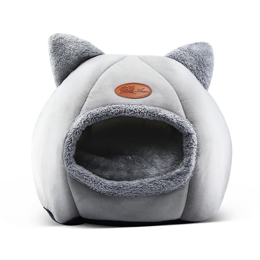 Gray plush cat bed shaped like a cozy cave with two ear-like protrusions.